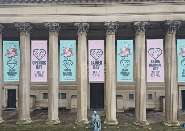 Outside of St George's Hall with banners for the Grand National hanging down.